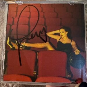 The life of a showgirl signed CD, signed by Taylor swift